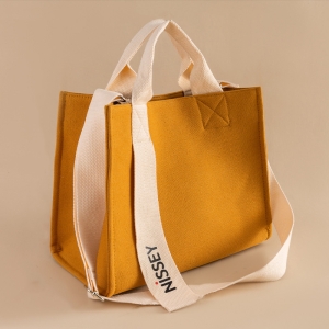 日系大容量撞色飄帶立體帆布手提單肩包